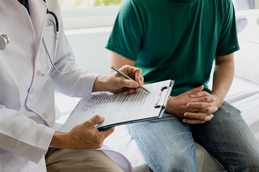 doctor talking with patient.